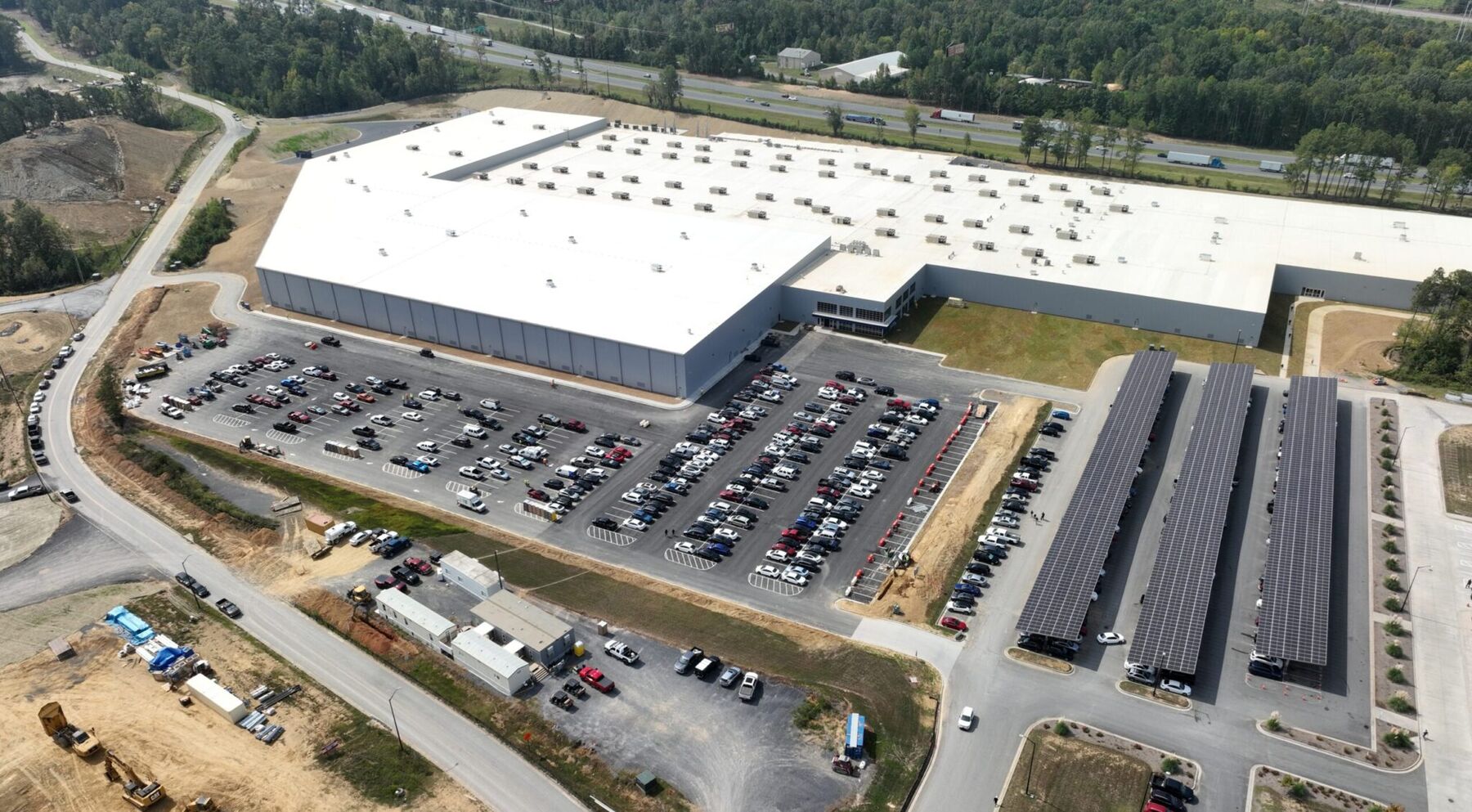 Aerial drone view of the Qcells Dalton, Georgia factory campus with solar carport canopies